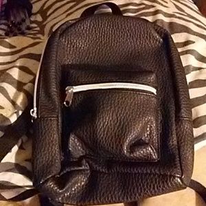 BLACK MINI BACKPACK- $6.00